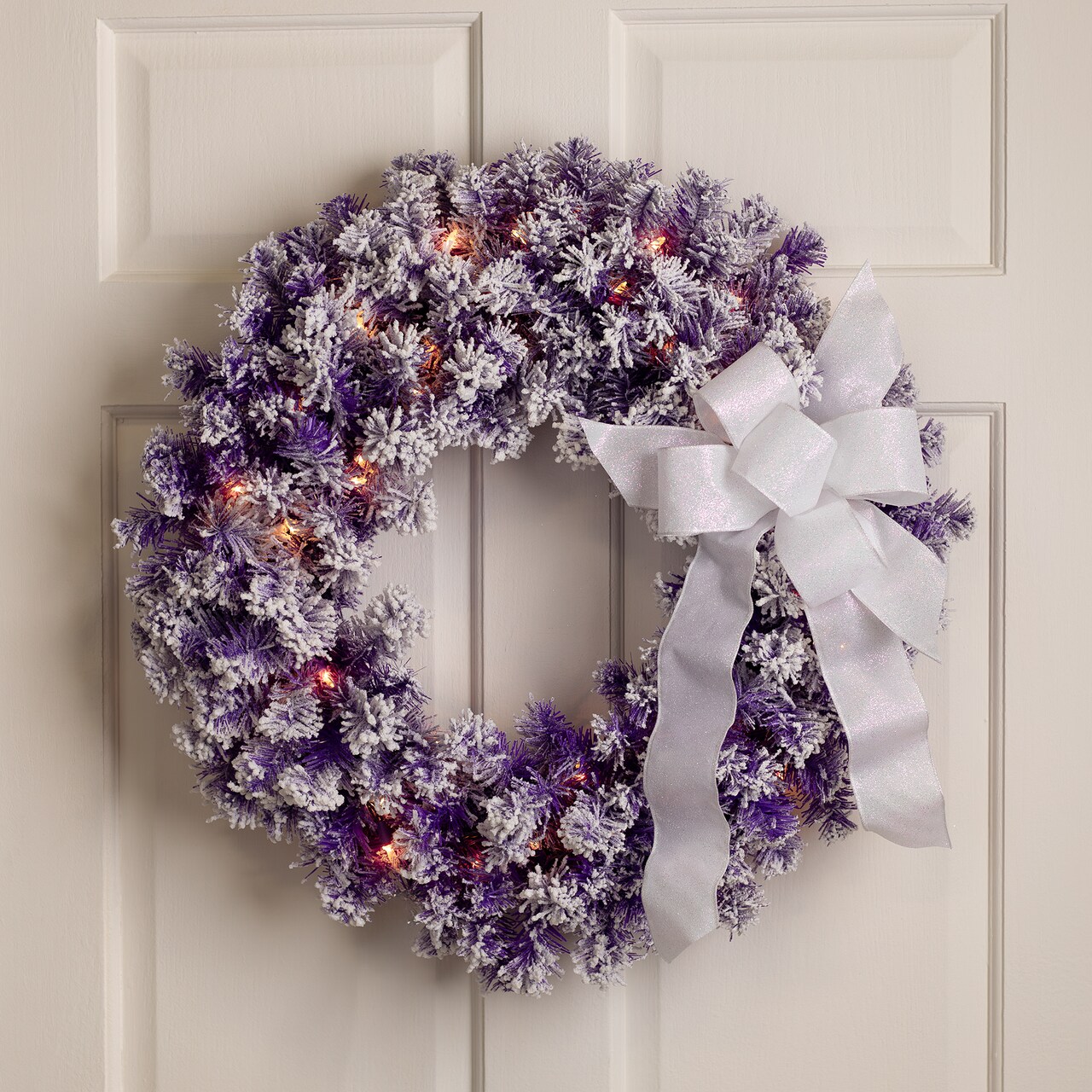 Northlight Pre-Lit Flocked Pine Artificial Christmas Wreath - 24" - Purple - Clear Lights